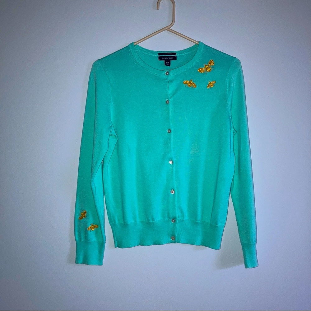 100 percent Pima cotton from Lands End. Embroidered golden Bee’s are adorable.